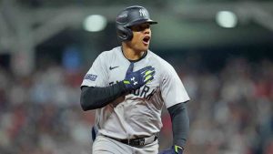 New York Yankees' Juan Soto celebrates after hitting a three-run home run against the Cleveland Guardians during the 10th inning in Game 5 of the baseball AL Championship Series Saturday, Oct. 19, 2024, in Cleveland. The Yankees won 5-2 to advance to the World Series. (Sue Ogrocki/AP)