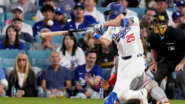 Los Angeles Dodgers' Tommy Edman hits a two-run home run against the New York Mets during the third inning in Game 6 of a baseball NL Championship Series, Sunday, Oct. 20, 2024, in Los Angeles. (Mark J. Terrill/AP)