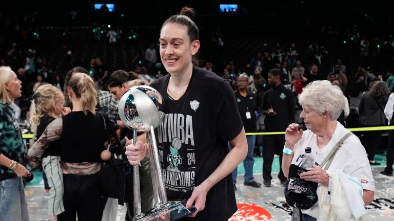 New York Liberty forward Breanna Stewart holds the championship trophy after the Liberty defeated the Minnesota Lynx in Game 5 of the WNBA basketball final series, Sunday, Oct. 20, 2024, in New York. (AP)