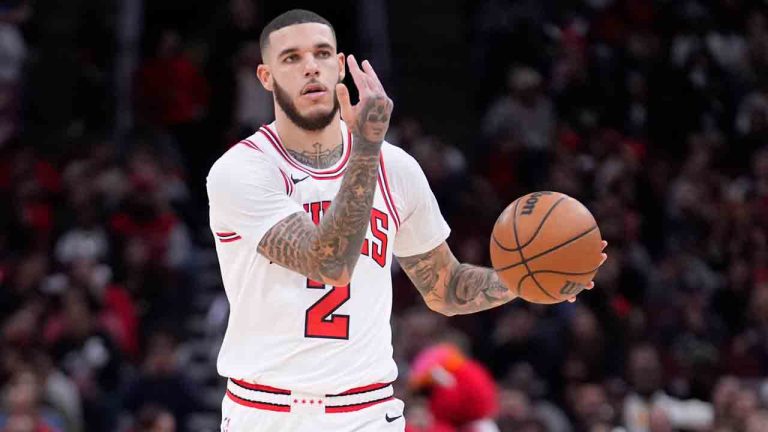 Chicago Bulls' Lonzo Ball directs a teammate during a preseason NBA basketball game Friday, Oct. 18, 2024, in Chicago. (Charles Rex Arbogast/AP)