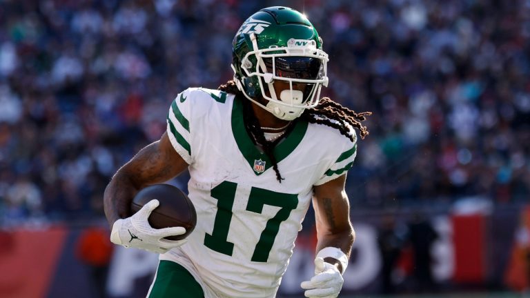 New York Jets wide receiver Davante Adams (17) carries the ball during the second half of an NFL football game against the New England Patriots on Sunday, Oct. 27, 2024, in Foxborough, Mass. The New England Patriots defeated the New York Jets 25-22. (Greg M. Cooper/AP) 