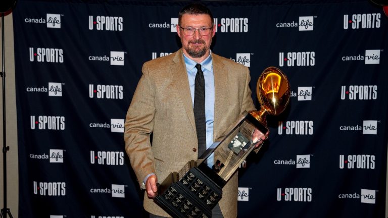 Former University of Alberta Golden Bears Head Coach Chris Morris wins the Frank Tindall Trophy at the 2023 USports Football Awards in Kingston, Ont., on Thursday, November 23, 2023. (CP/Reuben Polansky-Shapiro)