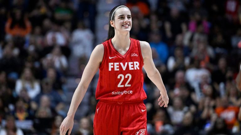 Indiana Fever guard Caitlin Clark (22) reacts during a first-round WNBA basketball playoff game against the Connecticut Sun, Wednesday, Sept. 25, 2024, in Uncasville, Conn. (Jessica Hill/AP)