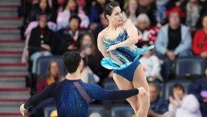 Deanna Stellato-Dudek and Maxime Deschamps of Canada compete in the pairs free program at the Skate Canada International figure skating competition. (Darren Calabrese/THE CANADIAN PRESS)