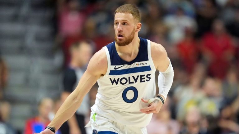 Minnesota Timberwolves guard Donte DiVincenzo reacts after making a three-point basket during the first half of an NBA preseason basketball game against the Philadelphia 76ers, Friday, Oct. 11, 2024, in Des Moines, Iowa. (Charlie Neibergall/AP Photo)