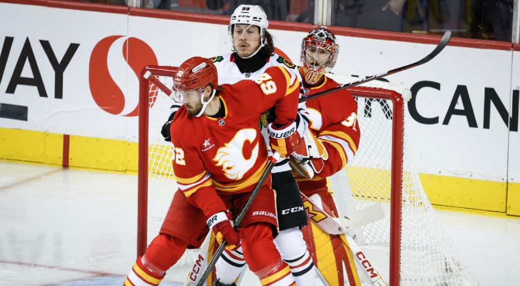 Wolf shuts door on Bedard as Flames keep perfect record intact