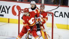 Wolf shuts door on Bedard as Flames keep perfect record intact