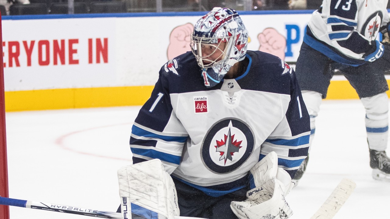 Comrie rejoins Jets looking to restart career behind Hellebuyck