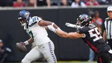 Smith throws two TD passes, Seahawks defence dominates Falcons