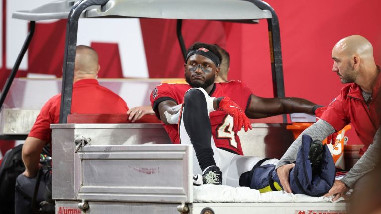 Tampa Bay Buccaneers wide receiver Chris Godwin (14) is carted off the field with an air cast during an NFL football game against the Baltimore Ravens , Monday, Oct. 21, 2024, in Tampa, Fla. (Peter Joneleit/AP Photo)