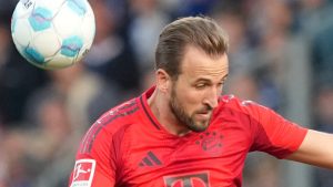 Bochum's Ivan Ordets holds Bayern's Harry Kane during the German Bundesliga soccer match between VfL Bochum and Bayern Munich in Bochum, Germany, Sunday, Oct. 27, 2024. (AP/Martin Meissner)