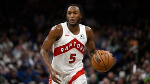 Toronto Raptors guard Immanuel Quickley (5) brings the ball up the court during the second half of an NBA basketball game against the Orlando Magic, Sunday, March 17, 2024, in Orlando, Fla. (Phelan M. Ebenhack/AP)