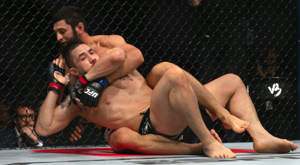 Khamzat-Chimaev-chokes-Robert-Whittaker-during-a-middleweight-bout-at-UFC-308-in-Abu-Dhabi