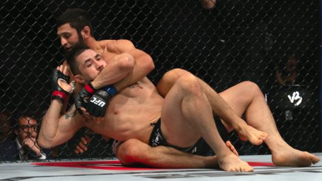 Khamzat-Chimaev-chokes-Robert-Whittaker-during-a-middleweight-bout-at-UFC-308-in-Abu-Dhabi