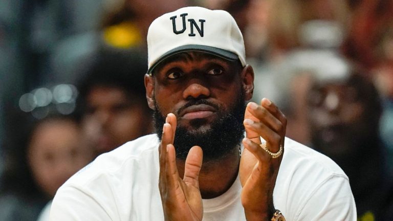 Los Angeles Lakers forward LeBron James reacts during the first half of a preseason NBA basketball game against the Sacramento Kings Wednesday, Oct. 11, 2023, in Anaheim, Calif. (Ryan Sun/AP Photo)