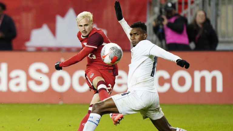 Canada's Liam Millar (23) shoots past Panama's Jiovany Ramos (14) during second half men's international friendly soccer action in Toronto, on Tuesday, October 15, 2024. (Frank Gunn/CP)