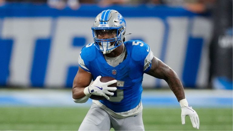 Detroit Lions running back David Montgomery (5) runs the ball against the Tampa Bay Buccaneers during an NFL football game. (Paul Sancya/AP)