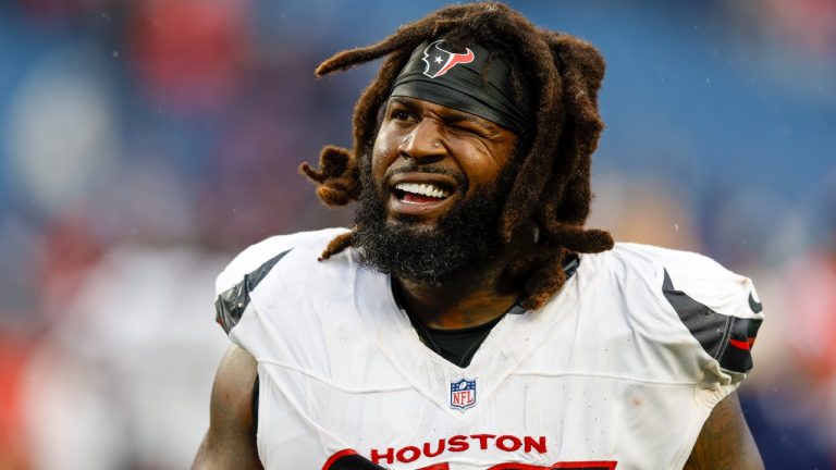 Houston Texans defensive tackle Mario Edwards Jr. (97) reacts after defeating the New England Patriots 41-21 in an NFL football game, Sunday, Oct. 13, 2024, in Foxborough, Mass. (Greg M. Cooper/AP)