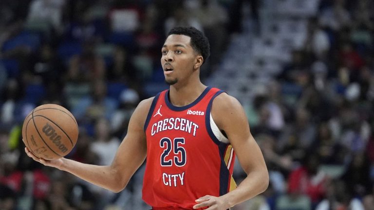 New Orleans Pelicans guard Trey Murphy III moves the ball down court in the first half of an NBA basketball game against the Phoenix Suns in New Orleans, Monday, April 1, 2024. (Gerald Herbert/AP Photo)