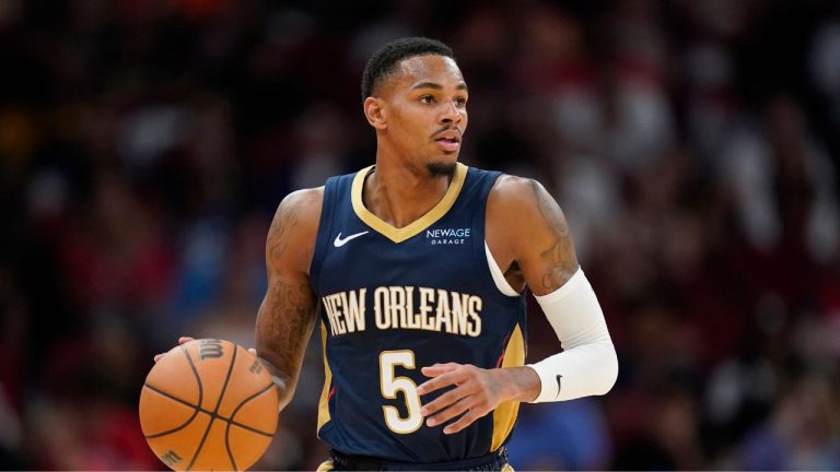 New Orleans Pelicans guard Dejounte Murray (5) dribbles against the Houston Rockets during the second half of an NBA preseason basketball game Tuesday, Oct. 15, 2024, in Houston. (Eric Christian Smith/AP Photo)