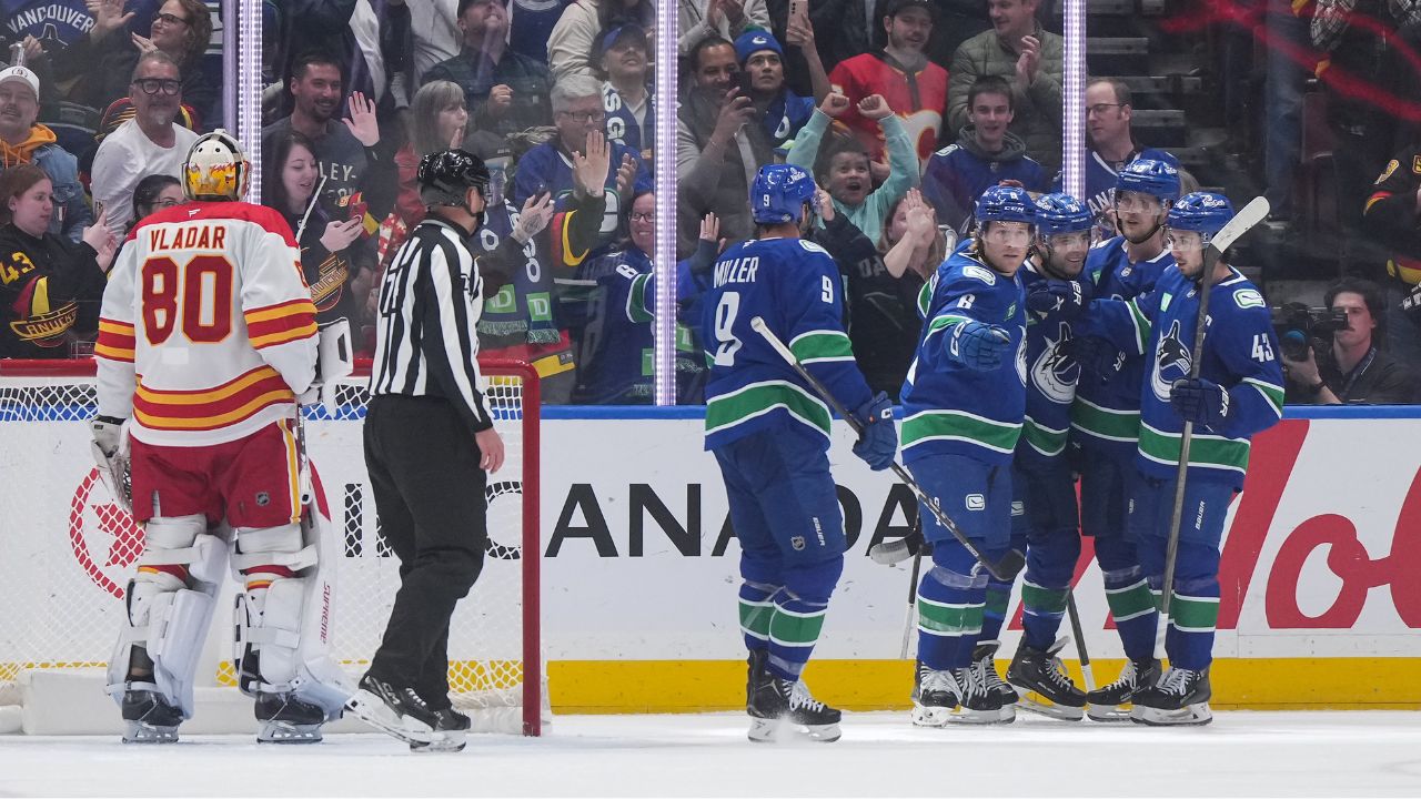 Canucks jump out to record four first-period goals in season-opener vs. Flames