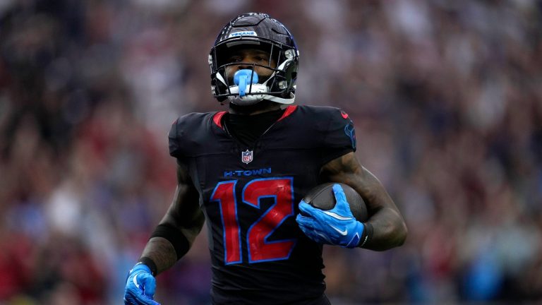 Houston Texans wide receiver Nico Collins scores on a 67-yard touchdown reception during the first half of an NFL football game Buffalo Bills, Sunday, Oct. 6, 2024, in Houston. (AP/Eric Gay)