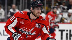 Washington Capitals centre Pierre-Luc Dubois chases the puck during the first period of an NHL hockey game against the Vegas Golden Knights. (AP Photo/John McDonnell)