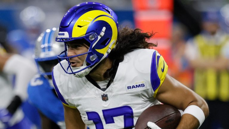 Los Angeles Rams wide receiver Puka Nacua (17) carries the ball against the Detroit Lions during the first half of an NFL football game Sunday, Sept. 8, 2024, in Detroit. (AP Photo/Duane Burleson)