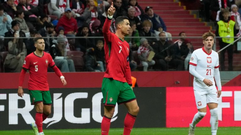 Portugal's Cristiano Ronaldo gestures during the UEFA Nations League soccer match between Poland and Portugal at Narodowy stadium in Warsaw, Poland, Saturday, Oct. 12, 2024. (AP Photo/Czarek Sokolowski)