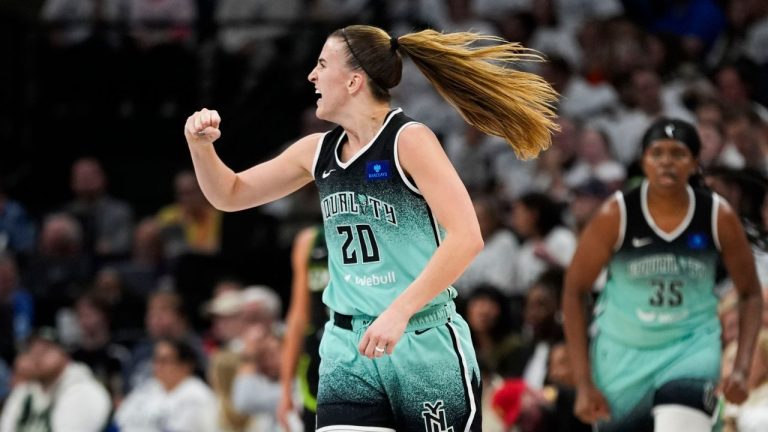 New York Liberty guard Sabrina Ionescu (20) reacts against the Minnesota Lynx during the second half of Game 4 of a WNBA basketball final playoff series, Friday, Oct. 18, 2024, in Minneapolis. (Abbie Parr/AP Photo)