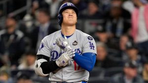 Los Angeles Dodgers' Shohei Ohtani reacts during the third inning in Game 3 of the baseball World Series against the New York Yankees, Monday, Oct. 28, 2024, in New York. (Ashley Landis/AP)