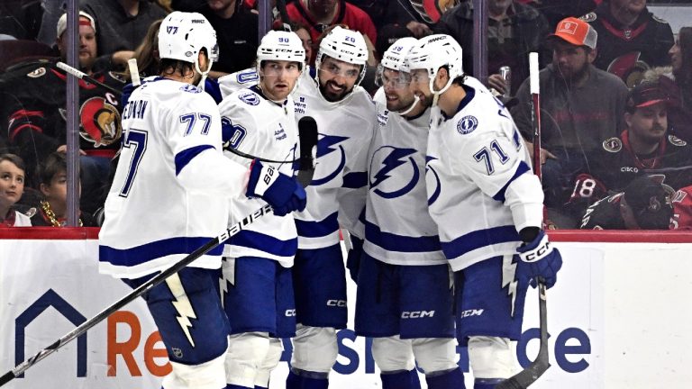 Tampa Bay Lightning left wing Nicholas Paul (20) celebrates a goal against the Ottawa Senators during second period NHL hockey action in Ottawa, on Saturday, Oct. 19, 2024. (Justin Tang/CP)