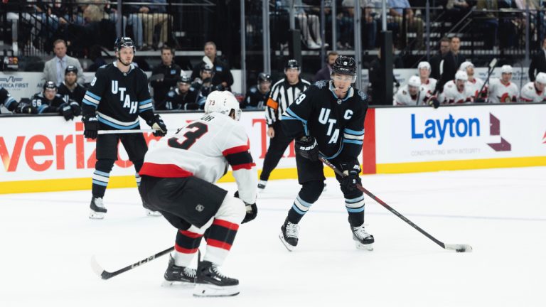 Utah Hockey Club forward Clayton Keller (9) moves the puck against Ottawa Senators forward Noah Gregor (73) during the second period of an NHL hockey game, Tuesday Oct 22, 2024, in Salt Lake City. (Melissa Majchrzak/AP)