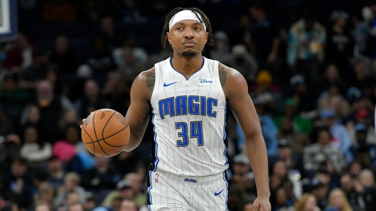 Orlando Magic center Wendell Carter Jr. (34) plays in the second half of an NBA basketball game against the Memphis Grizzlies Friday, Jan. 26, 2024, in Memphis, Tenn. (AP Photo/Brandon Dill)