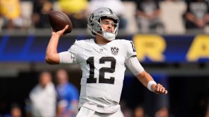 Las Vegas Raiders quarterback Aidan O'Connell (12) throws a pass during the first half of an NFL football game against the Los Angeles Rams. (Marcio Jose Sanchez/AP)