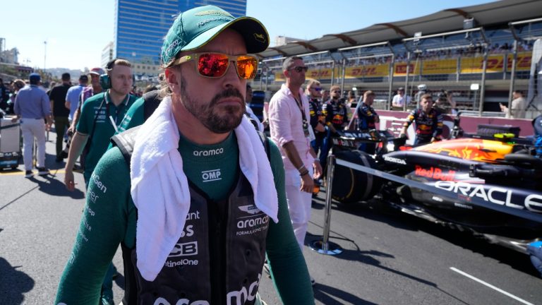 Aston Martin driver Fernando Alonso of Spain arrives for the Formula One Grand Prix in Baku, Azerbaijan, on Sunday, Sept. 15, 2024. (Sergei Grits/AP)