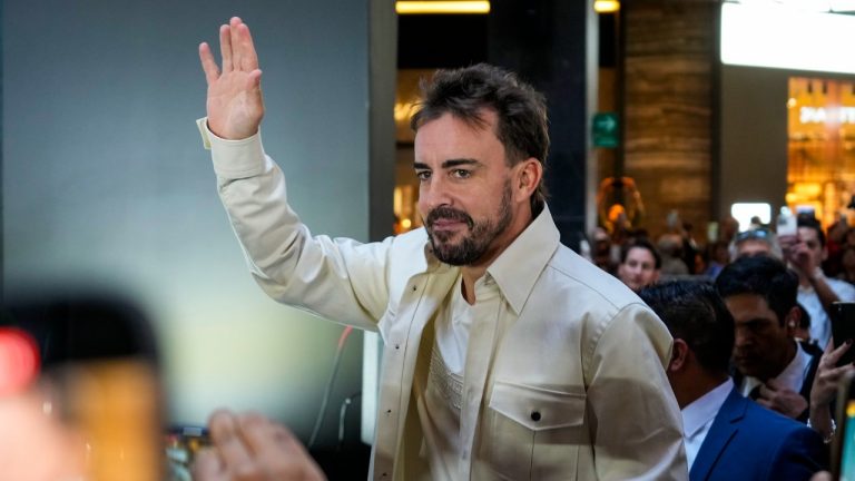 Aston Martin driver Fernando Alonso of Spain arrives at a promotional event in Mexico City, Wednesday, Oct. 23, 2024, ahead of the weekend Formula One Mexico Grand Prix auto race. (Moises Castillo/AP)