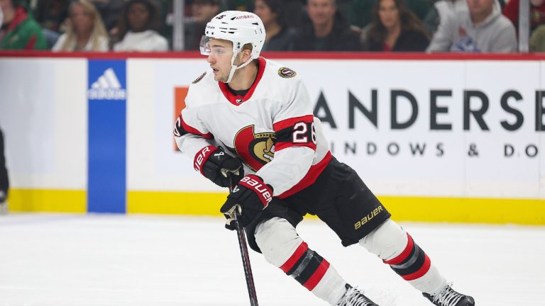 Ottawa Senators defenceman Erik Brannstrom (26) skates with the puck during the first period of an NHL hockey game against the Minnesota Wild Tuesday, April 2, 2024, in St. Paul, Minn. (Matt Krohn/AP)