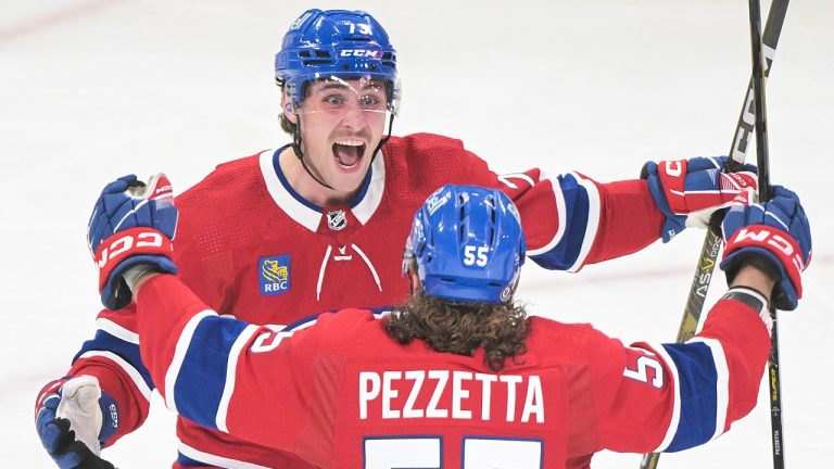 Montreal Canadiens' Lucas Condotta (73) celebrates with teammate Michael Pezzetta (55) after scoring against the Boston Bruins during first period NHL hockey action in Montreal, Thursday, April 13, 2023. (Graham Hughes/CP)