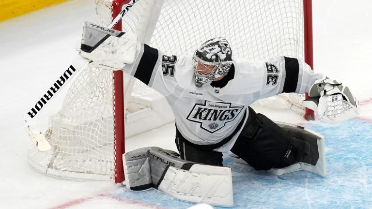 Los Angeles Kings' Darcy Kuemper deflects a shot in overtime during an NHL hockey game against the Boston Bruins, Saturday, Oct. 12, 2024, in Boston. (Michael Dwyer/AP)