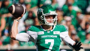 Saskatchewan Roughriders quarterback Trevor Harris (7) throws against Ottawa Redblacks during the first half of CFL football action in Regina, on Saturday, September 28, 2024. (Heywood Yu/THE CANADIAN PRESS)