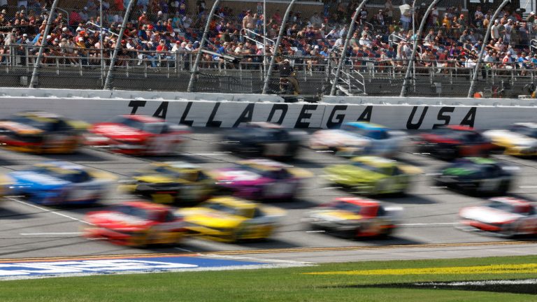 Drivers race down the front stretch three wide during a NASCAR Cup Series auto race at Talladega Superspeedway, Sunday, Oct. 6, 2024, in Talladega, Ala. ( Butch Dill/AP)