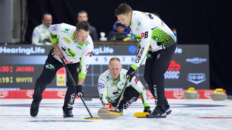 Brad Jacobs (centre) watches his stone as Ben Hebert (left) and Brett Gallant (right) prepare to sweep during the HearingLife Tour Challenge on Wednesday, Oct. 2, 2024, in Charlottetown. (Anil Mungal/GSOC)