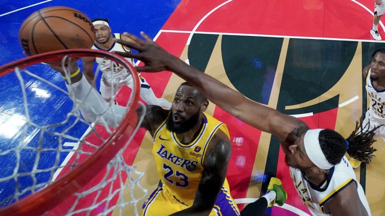 Los Angeles Lakers forward LeBron James (23) drives against Indiana Pacers centre Myles Turner, right foreground, during the first half of the championship game in the NBA basketball In-Season Tournament, Saturday, Dec. 9, 2023, in Las Vegas. (Kyle Terada/Pool Photo via AP)