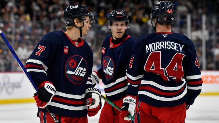 Winnipeg Jets' Vladislav Namestnikov (7) talks to Nikolaj Ehlers (27) and Josh Morrissey (44) during second period NHL hockey action against the Pittsburgh Penguins in Winnipeg, Sunday, Oct. 20, 2024. (Fred Greenslade/CP)