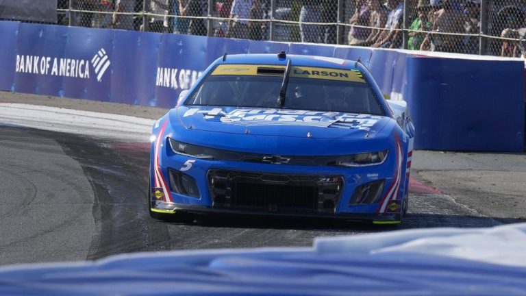 Kyle Larson drives out out Turn 3 during a NASCAR Cup Series auto race at Charlotte Motor Speedway. (Chuck Burton/AP)
