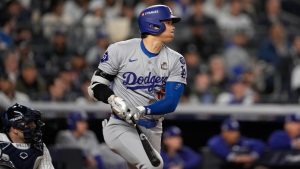 Los Angeles Dodgers' Shohei Ohtani watches his single against the New York Yankees during the fifth inning in Game 4 of the baseball World Series, Tuesday, Oct. 29, 2024, in New York. (Godofredo A. Vásquez/AP)