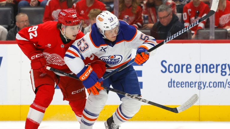 Detroit Red Wings centre Marco Kasper (92) tangles with Edmonton Oilers center Jeff Skinner (53) during the first period of an NHL hockey game. (Duane Burleson/AP)