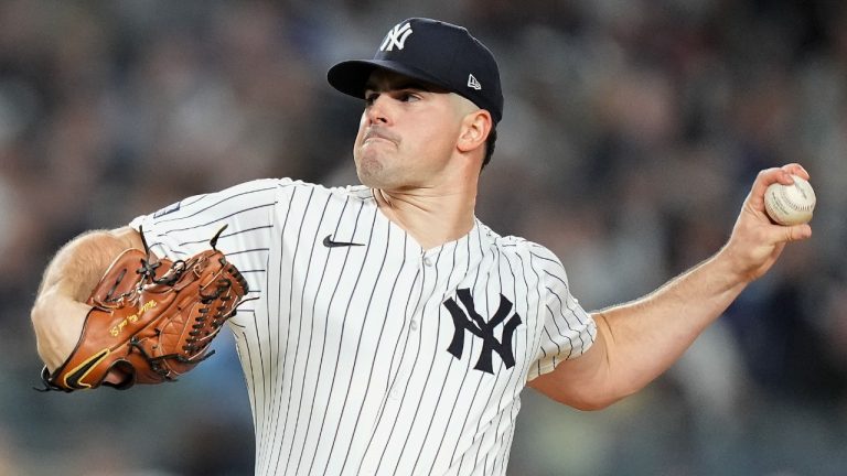 New York Yankees pitcher Carlos Rodón delivers against the Kansas City Royals during the first inning of Game 2 of the American League baseball playoff series, Monday, Oct. 7, 2024, in New York. (Frank Franklin II/AP)