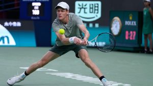 Jannik Sinner of Italy plays a backhand return against Machac of the Czech Republic during the men's singles semifinals match in the Shanghai Masters tennis tournament at Qizhong Forest Sports City Tennis Center in Shanghai, China, Saturday, Oct. 12, 2024. (Andy Wong/AP)